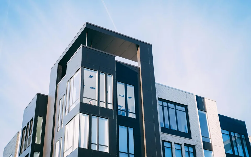 Modern apartment building with balconies.